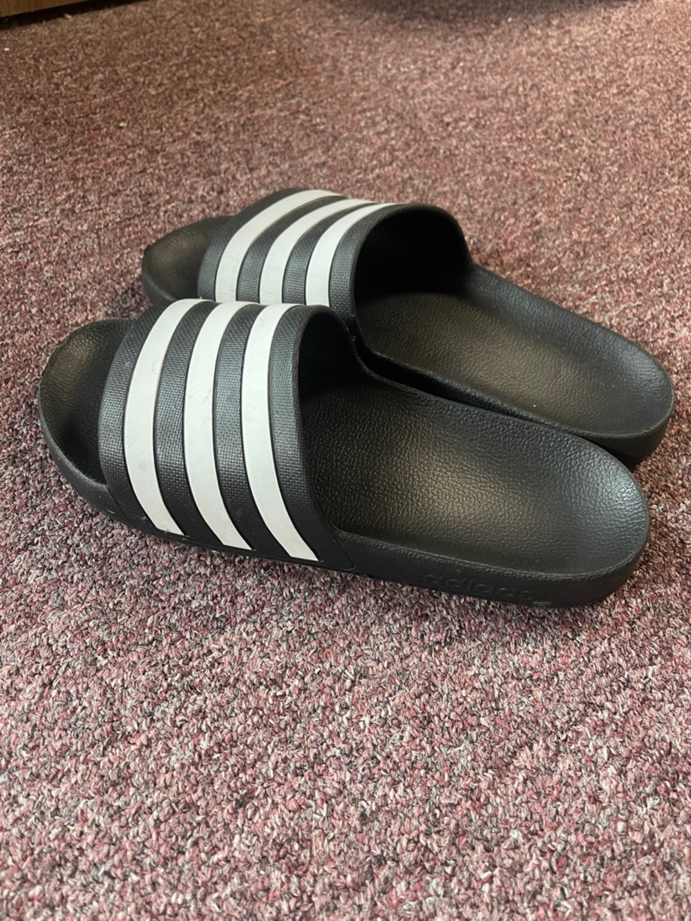 adidas Black Slides with White Accent Stripes